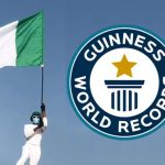 Nigerian Flagboy John Eze begins the Longest Hand-flown National Flag Marathon in Lagos