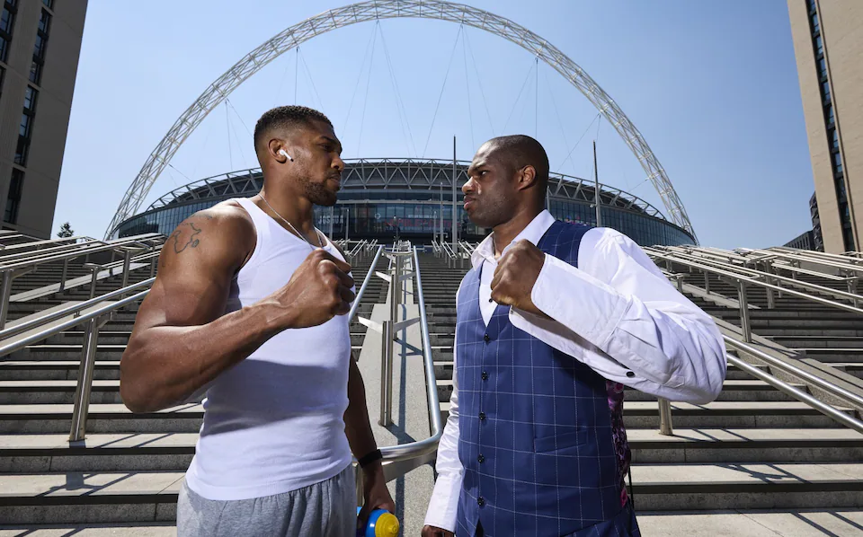 Anthony Joshua and Daniel Dubois pose outside Wembley stadium