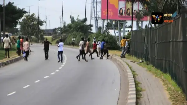 Lagos Police Watch As Hoodlums Attack Protesters, Chase Journalists At Ojota